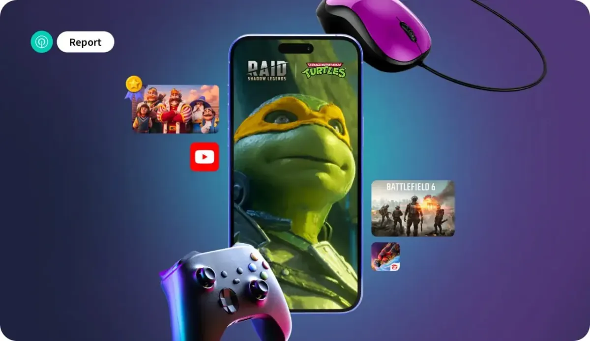 Smartphone showing a turtle-themed mobile game surrounded by gaming elements, representing portfolio-level UA planning for multiple titles