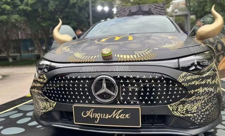 Abstract landscape-style hero photo with partially readable overlaid text related to US and markets